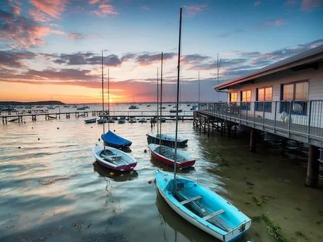 Sandbanks peninsula between Poole Harbour and the open sea, with the chain ferry crossing to Studland